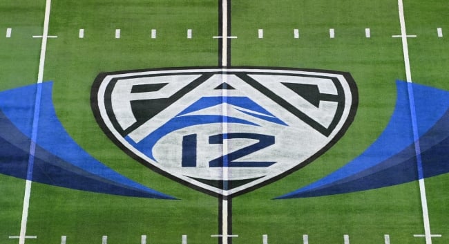 Pac-12 logo at midfield of a football field